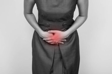 Woman with hemorrhoids, has a stomach pain clipart