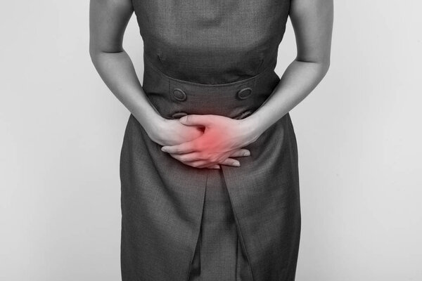 Woman with hemorrhoids, has a stomach pain