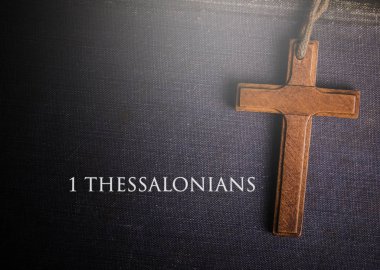 A cross with Bible book of 1 Thessalonians clipart