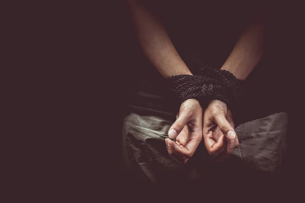 Vintage tone of Hands of a missing kidnapped victim — Stock Photo, Image