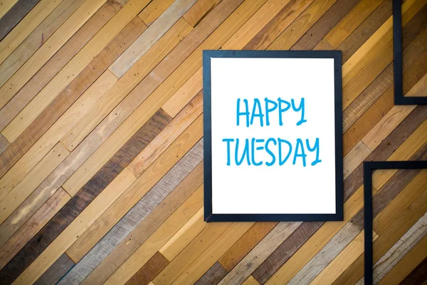 Happy Tuesday word abstract in vintage letterpress wood type against  textured handmade paper with a cup of coffee, cheerful greetings Stock  Photo - Alamy