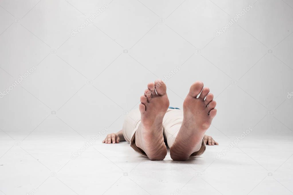 Dead person. Focus at the Feet