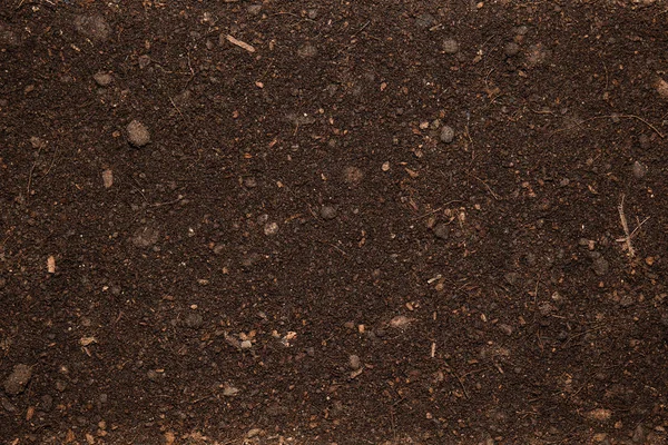 Ένα σκοτεινό χώμα που χρησιμοποιεί για μια υφή — Φωτογραφία Αρχείου