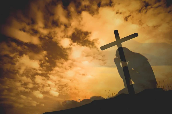 Praying with cross background — Stock fotografie