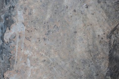 arkaplan olarak gri bir beton kullanılıyor