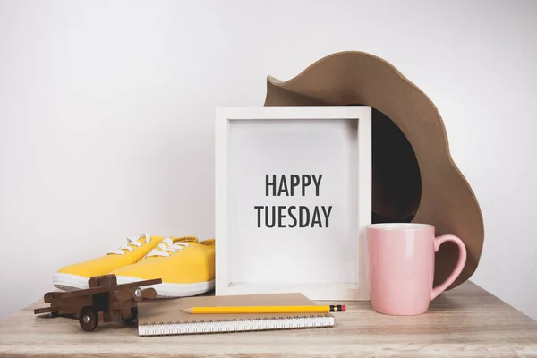 Happy Tuesday word two cups of coffee and stand together Stock Photo by  ©aradaphotography 281450326