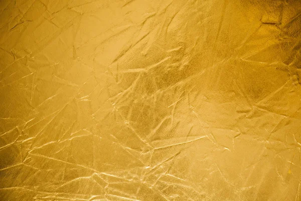 Guld rynka med en bakgrund — Stockfoto