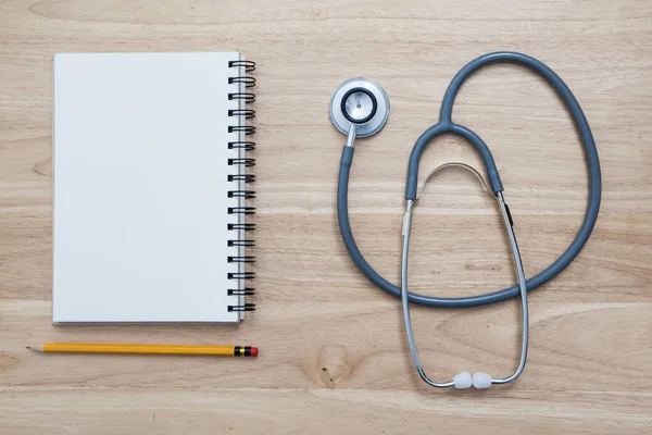 Doctor tool stethoscope on table background