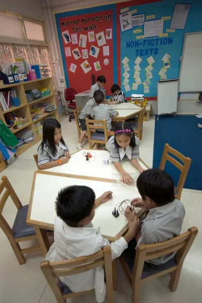 Young kids student study in classroom. — Stock Photo, Image