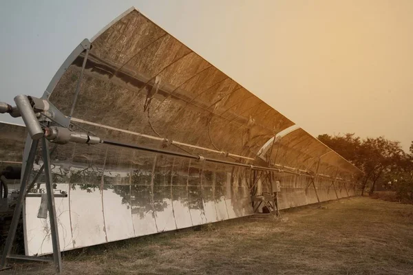 Solar Parabolic Troughs , alternative electricity source is a concept of sustainable resources and save environment. — Stock Photo, Image