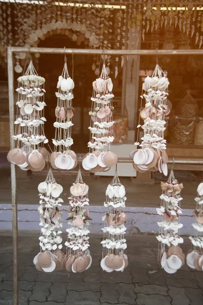 Sea shell mobile hanging decoration in the shop for sell tourist.