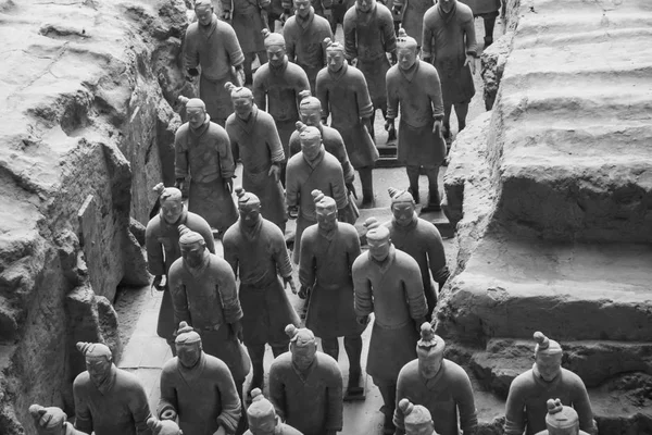 Terra Cotta Warriors in Pit 1 in black and white at burial site of Emperor Qin Shi Huang Di in Xi\'an, Shaanxi, China.