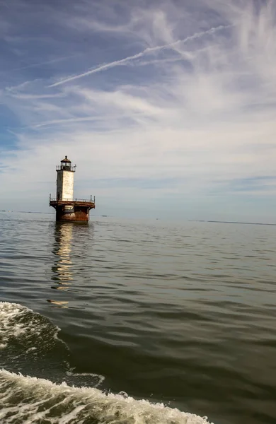 Solomons Lump Lighthouse reflecting in Chesapeake Bay — Stock Image Solomons Lump Lighthouse reflecting in Chesapeake Bay Stock Picture