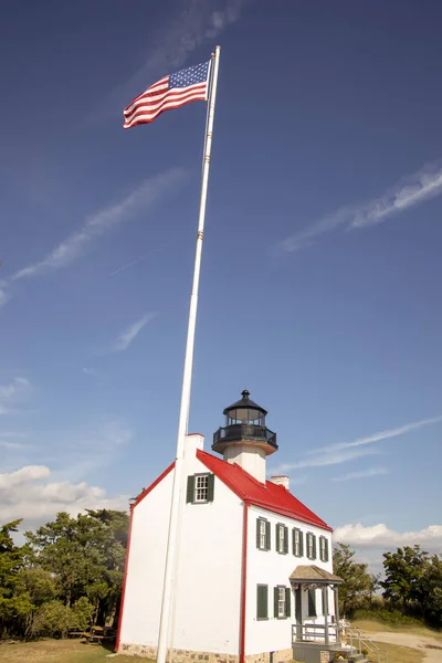 East Point or Maurice River Lighthouse with American flag
