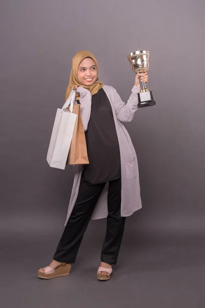 Clever Consumer Concept Happy Malay Girl Holding Shopping Bags Gold — Stock Photo, Image