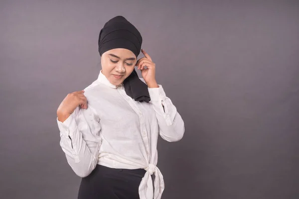 Portraiture of young asian girl wearing turban.Hijab fashion for Muslim female teenager.Studio shot.