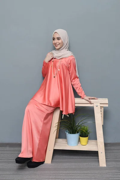 Hijab fashion.Cute Muslim girl wearing Hijab and traditional cloth.Fashion for eid celebration.