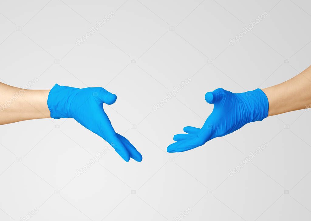 Nitrile glove. Medic's hands blue. Open