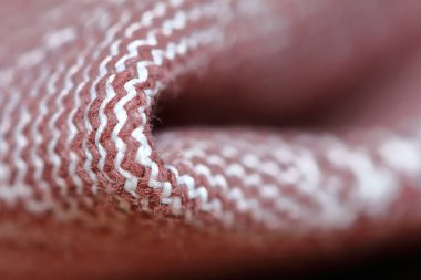 Güzel bir arkaplan için soyut makro kumaş içinde güzel kırmızı ve beyaz kumaş dokusu