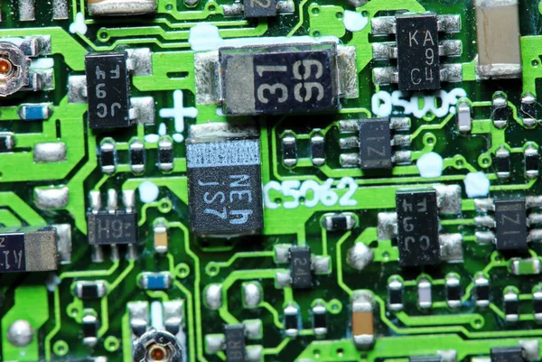 Elektrik arkaplanı için makro fotoğrafçılıkta bilgisayar için eski elektonik devre kartı