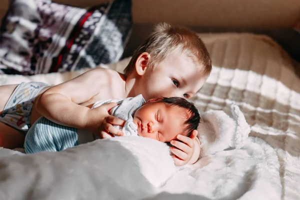 Happy Little Brother Newborn Baby Lying Bed Together Kissing Hugging — Stock Photo, Image