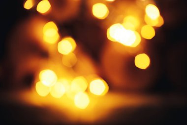 Odak renkli Bokeh arka plan, sarı bokeh birçok gerland sayfasından dekore edilmiş