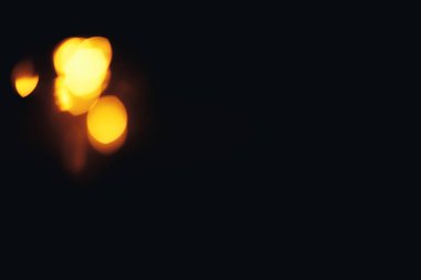 Noel arkaplanı. Bokeh odaklı ışıklar ve yıldızlarla şenlikli soyut arkaplan