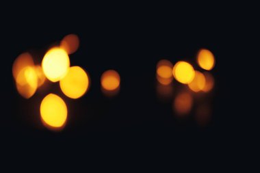 Noel arkaplanı. Bokeh odaklı ışıklar ve yıldızlarla şenlikli soyut arkaplan