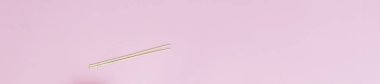 minimalizm Chopsticks pembe arka plan uzun afiş yatık üzerinde yatık