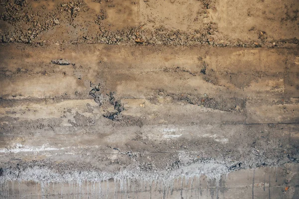 Parede velha feita de cimento e argamassa de escória com fundo de rachaduras cinza — Fotografia de Stock