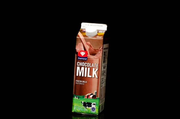 Close Tilted Chocolate Milk Box Diamond Trademark Isolated Black Background — Stock fotografie