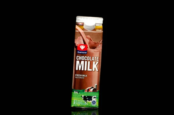 Close Tilted Chocolate Milk Box Diamond Trademark Isolated Black Background — Stock fotografie