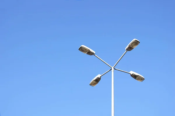 stock image Street lamps with economical lamps with on a background of cloudless sky.