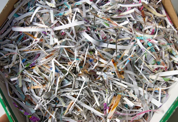 CloseUp shredded paper texture and reuse paper scrap background. Selective focus image.