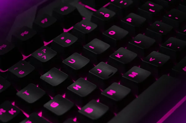 Backlit Gaming Keyboard Close Black Keys Pink Illuminated Characters — Stock Photo, Image