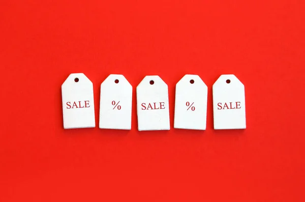 Five Wooden Tags Word Sale Red Background — Stock Photo, Image