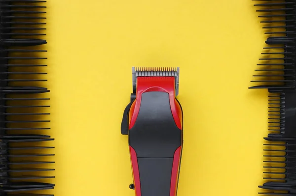 Hairdressers Tool Hair Clipper Close Yellow Background Nozzles Different Sizes — Stock Photo, Image