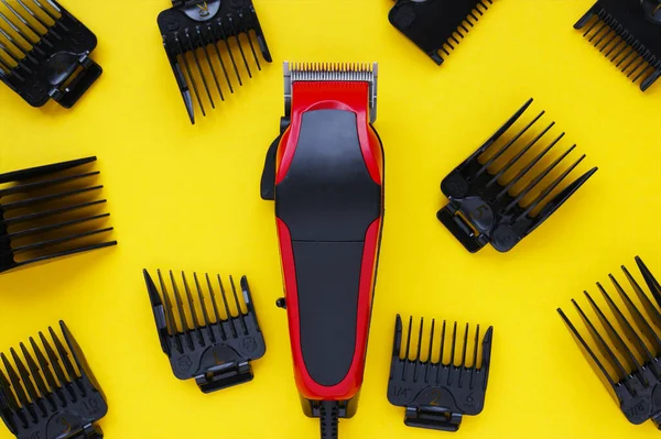 Hairdressers Tool Hair Clipper Close Yellow Background Nozzles Different Sizes — Stock Photo, Image