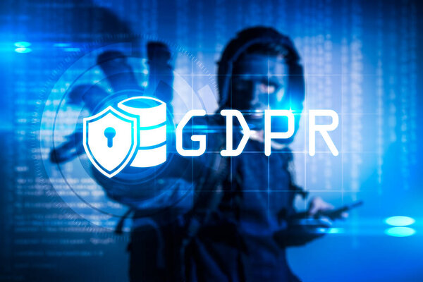The abstract image of the hacker hold the GDPR hologram on hand. the concept of data, communications, privacy, internet of things and GDPR.