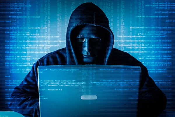 Hacker Using Laptop Computer — 图库照片