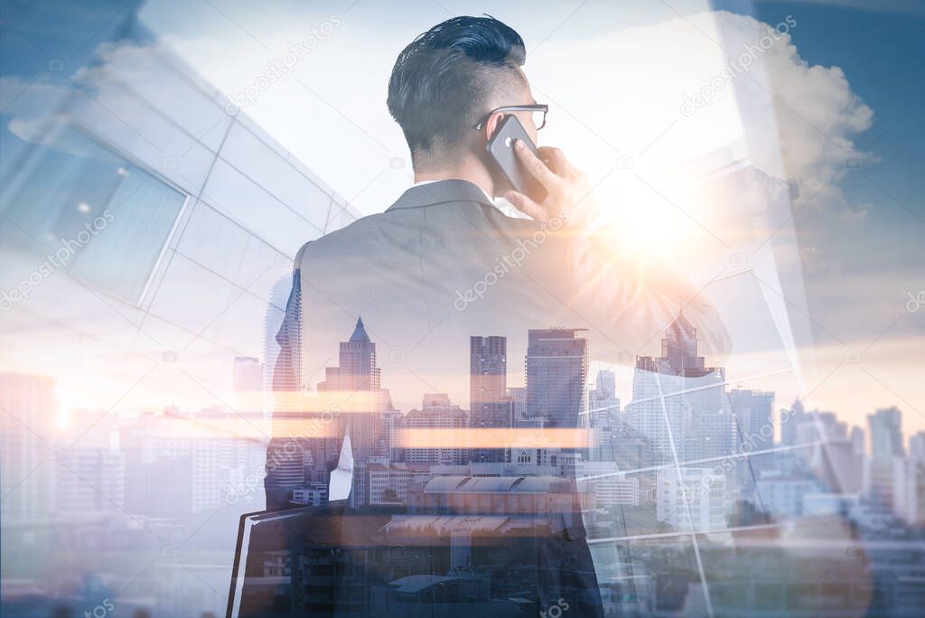 double exposure of businessman using mobile phone, rear view 