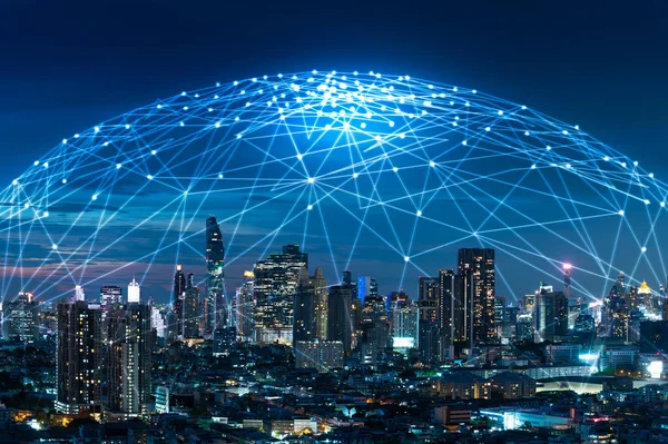 the abstract image of the cityscape image overlay with the futuristic network hologram. the concept of 5G, communication, network, connection, internet of things.