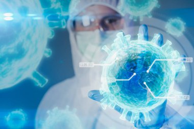 Bilim adamları Coronavirus 'un hologramını laboratuvarda tutuyorlar. Koronavirüs, aşı, laboratuvar ve tıbbi konsept.
