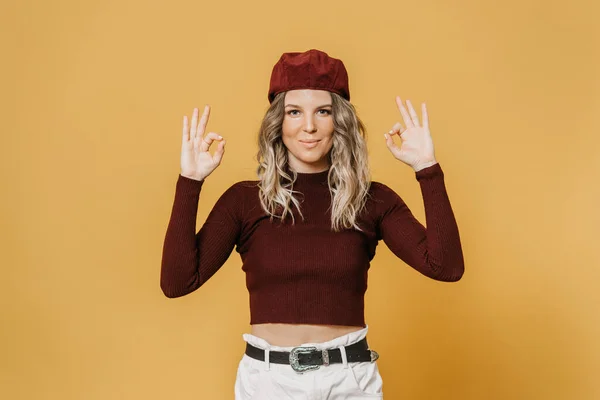 Charming Young Blonde Wearing Burgundy Sweater Cap White Jeans Cute — Stock Photo, Image