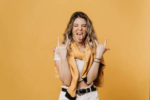 Crazy Young Blonde Woman Dressed Casual Shows Rock Hands Stuck — Stock Photo, Image