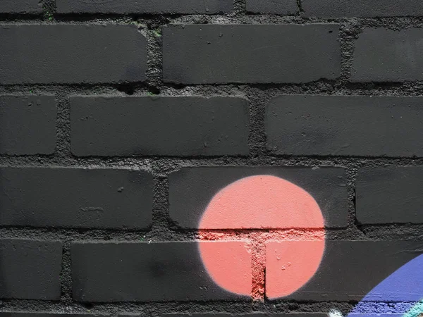 Black brick wall texture closeup