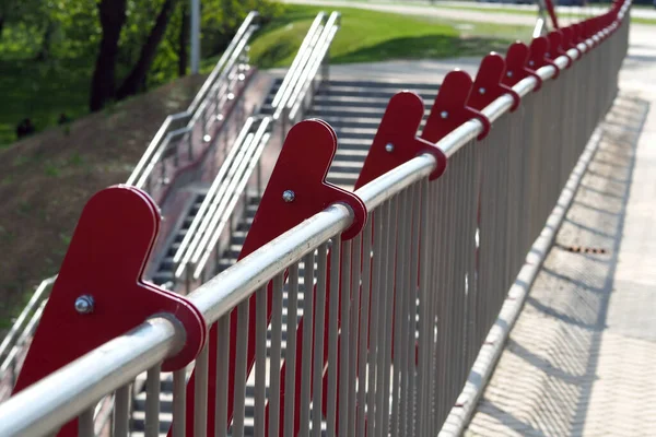 Pedestrian bridge fencing and metal stair railing. Fall Safety