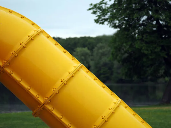 large yellow tank in the park