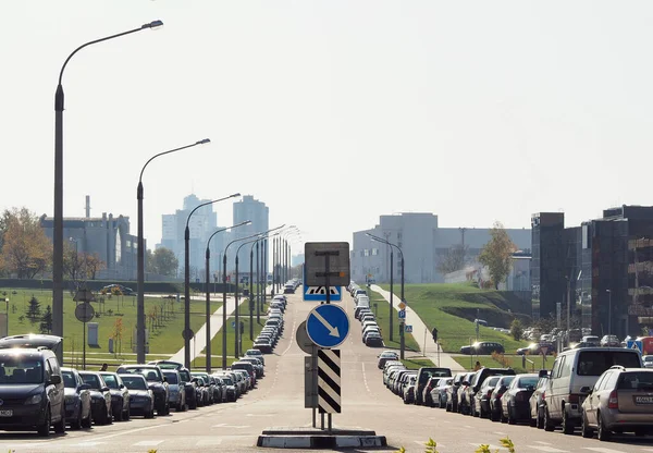 Minsk, Republic of Belarus - 10.14.2019: Spontaneous parking along the road during working hours. A large number of vehicles. Parking problems.