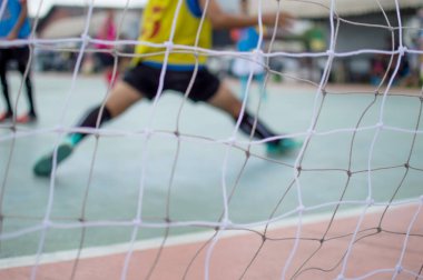 Ağlı ayakların ve futbolcuların bulanık görüntüleri...
